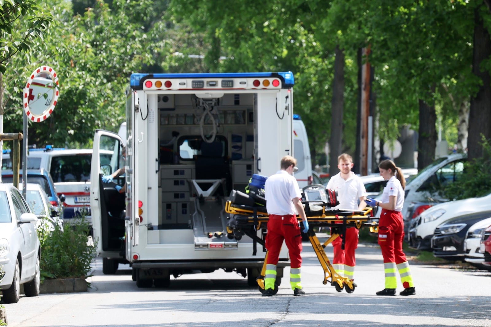 Rescue service personnel attend the scene of a shooting at a school in Graz, Austria, Tuesday, June 10, 2025. (Kleine Zeitung via AP)