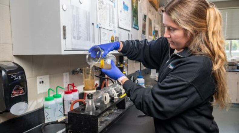 Morgan Jutte, a research assistant and lab manager, conducting water quality testing at Lake Campus’ Agriculture and Water Quality Education Center. (Photos Courtesy of Wright State, by Erin Pence)