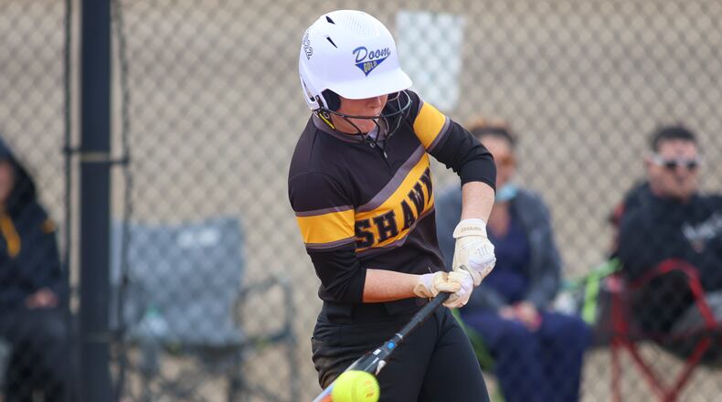 Shawnee High School junior Dani Ross connects with a pitch during a recent scrimmage game against Sidney on March 22 in Springfield. Michael Cooper/CONTRIBUTED