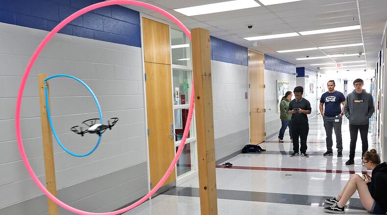 Joaquin Madison practices flying one of the drones in the new program at the Springfield School District's School of Innovation Thursday, April 13, 2023. BILL LACKEY/STAFF