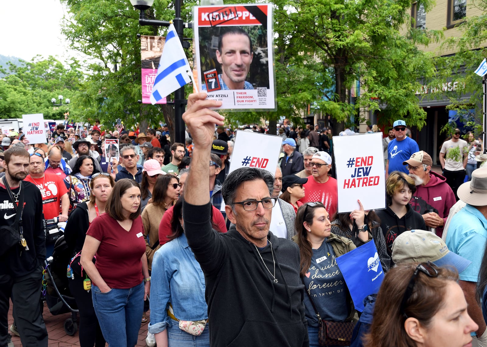 Jeff Burak marches in Boulder, Colo., on Sunday, June 8, 2025, to call for the release of Israeli hostages. (AP Photo/Thomas Peipert)