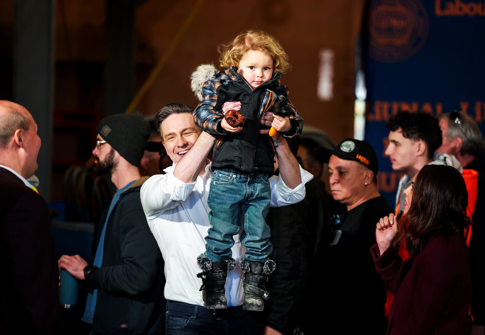FILE - Conservative Leader Pierre Poilievre lifts his son Cruz up after speaking at a pre-election event in Ottawa, on March 21, 2025. (Justin Tang /The Canadian Press via AP, File)