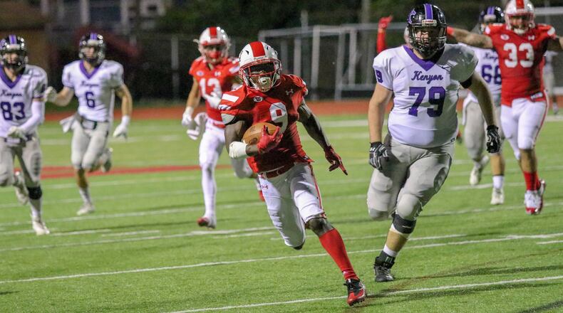 Wittenberg University junior Troy Jones returns an interception during the Tigers’ 45-3 victory over Kenyon at Edwards-Maurer Field in Springfield in 2018. Michael Cooper/Contributed