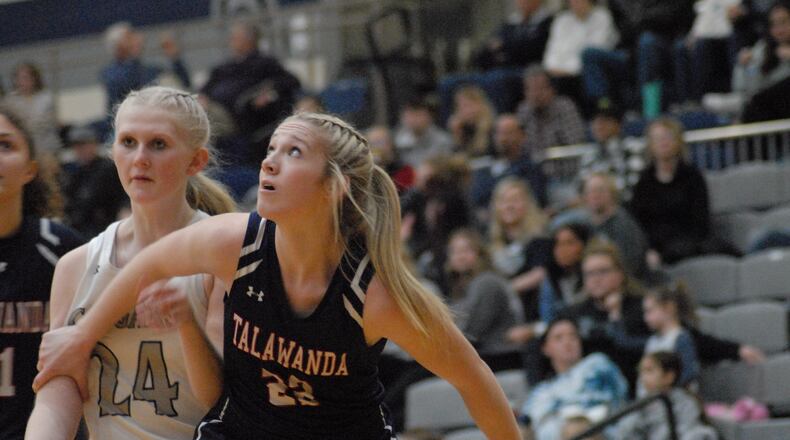 Talawanda junior Myah Keene (22) boxes out Edgewood freshman Ella Allen (24) during a game earlier this season. Chris Vogt/CONTRIBUTED