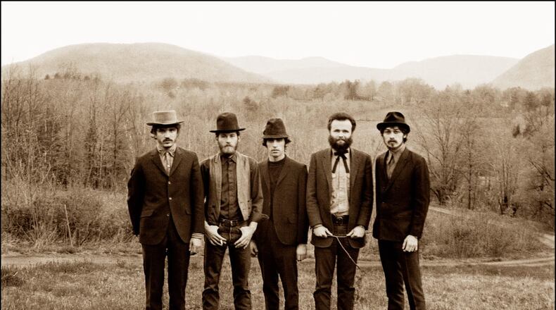 The Band, pictured in 1968. Left to right: Rick Danko, Levon Helm, Richard Manuel, Garth Hudson and Robbie Robertson in the Catskills posing for Music From Big Pink. ELLIOT LANDY/CONTRIBUTED