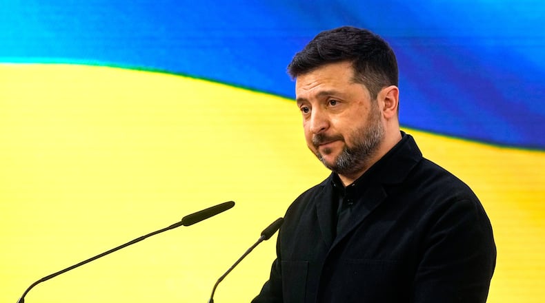 Ukraine's President Volodymyr Zelenskyy addresses the audience during a session at the Munich Security Conference in Munich, Germany, Saturday, Feb. 14, 2026. (AP Photo/Michael Probst)