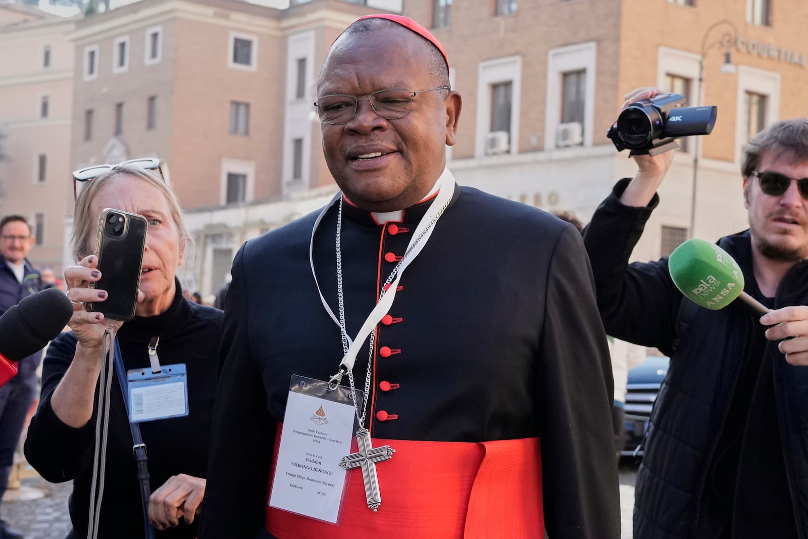 FILE - Cardinal Fridolin Ambongo Besungu arrives for a college of cardinals' meeting, at the Vatican, Wednesday, April 30, 2025. (AP Photo/Gregorio Borgia, File)