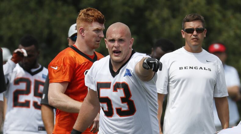 Cincinnati Bengals center Billy Price (53) signals to his players during NFL football practice, Thursday, July 26, 2018, in Cincinnati. (AP Photo/John Minchillo)