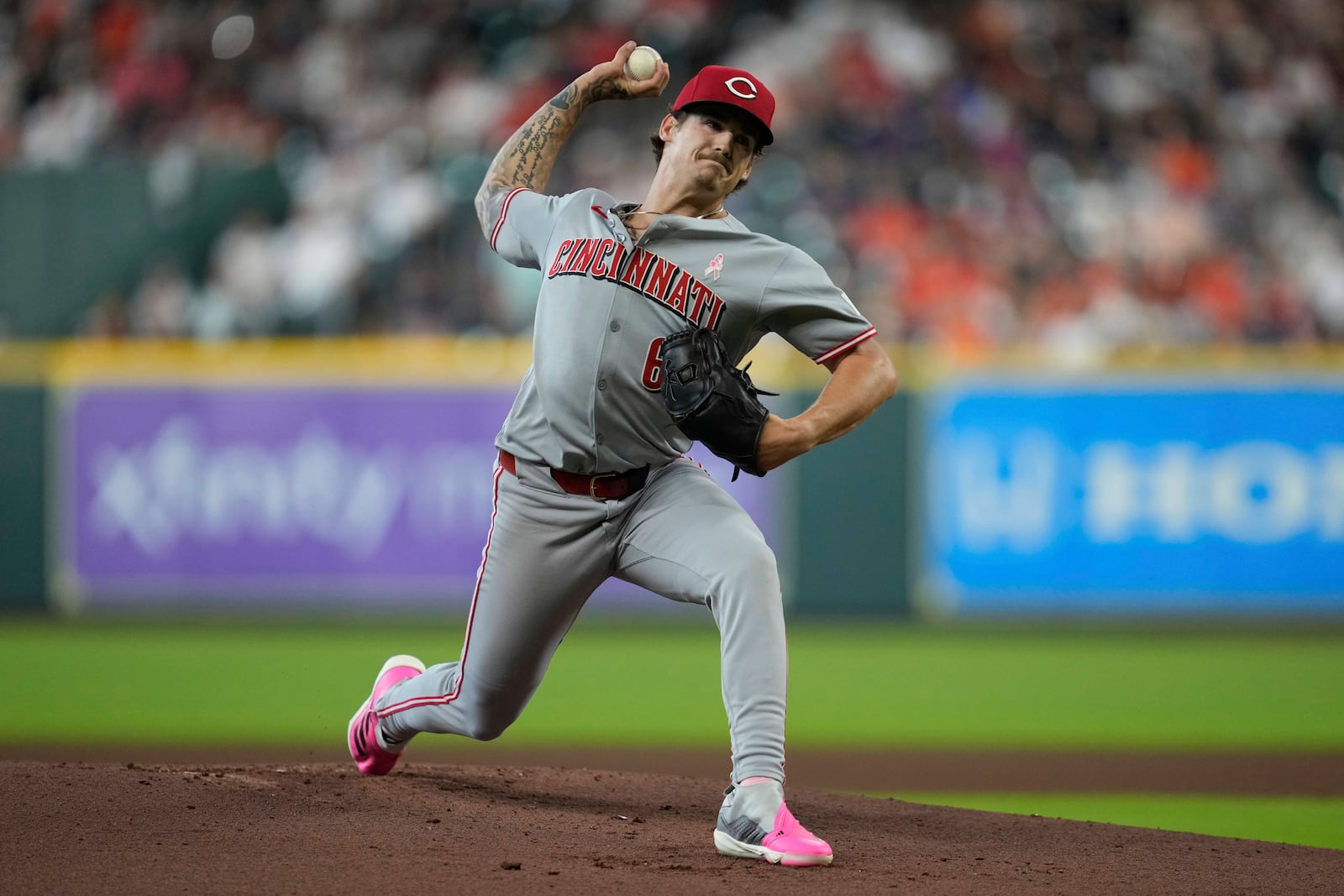Cincinnati Reds starting pitcher Chase Petty (61) throws during the first inning of a baseball game against the Houston Astros in Houston, Sunday, May 11, 2025. (AP Photo/Ashley Landis)