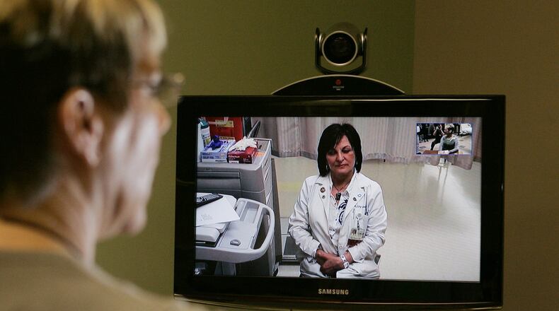 Dayton-area medical providers are scrambling to find ways to care for patients without putting them at risk of catching the coronavirus. For some local doctors, that means moving appointments out of the office and onto the internet.