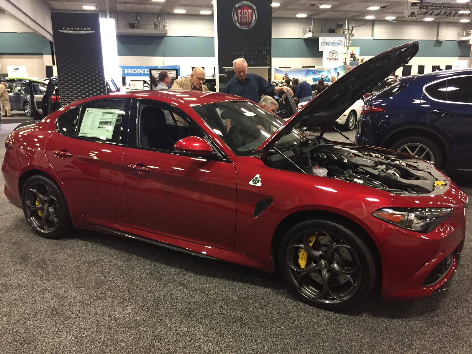 Adding an Italian note to the Dayton Auto Show floor is the Alfa Romeo Giulia Quadrifoglio. A Ferrari-derived 505-hp 2.9-liter twin-turbo V-6 drives the rear wheels; an eight-speed automatic is the only available transmission. AMY ROLLINS / STAFF