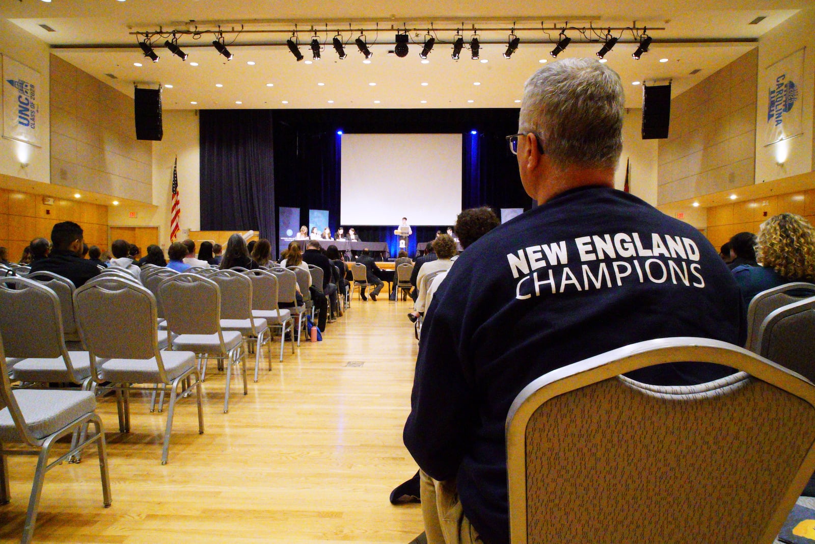 Spectators watch the finals of the National High School Ethics Bowl in in the student union of the University of North Carolina Chapel Hill, N.C., on Sunday, April 13, 2025. (AP Photo/Allen G. Breed)
