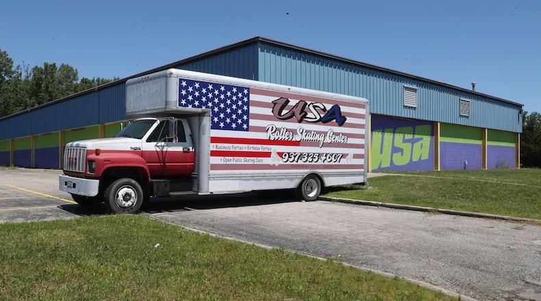 The owner of USA Roller Skating Center in Springfield has been cleaning the roller skating center in preparation for reopening in September. BILL LACKEY/STAFF