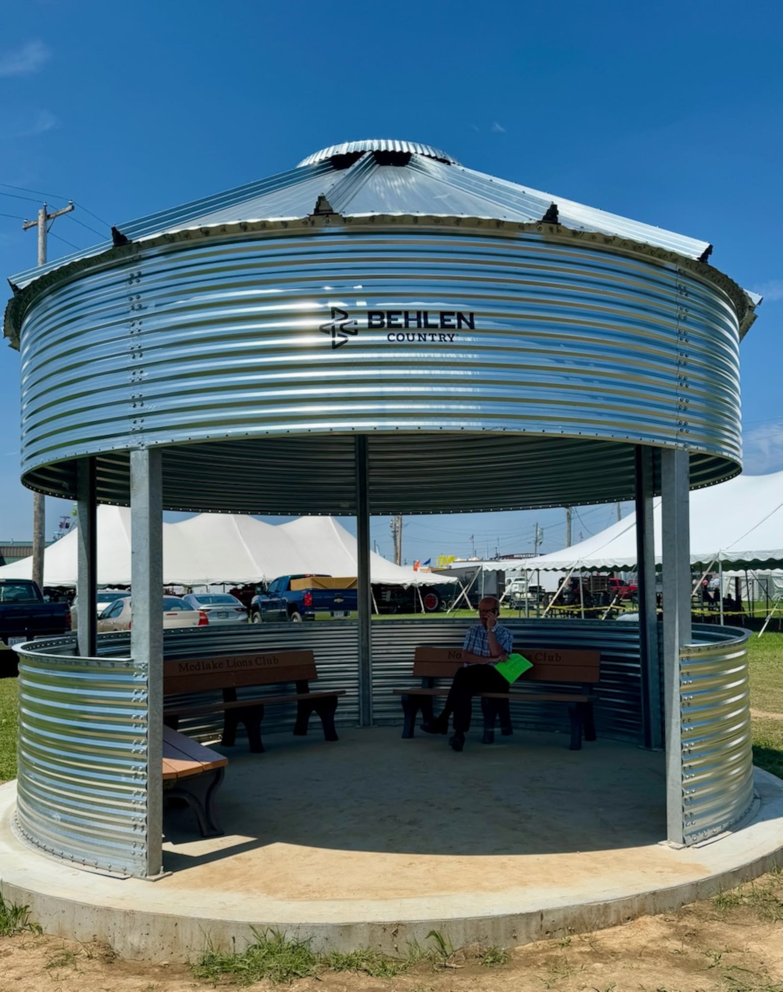 Lynn Zechman, owner of Jones Kenney Zechman Funeral Home in Springfield, found shade from the sun in the new BinVista at the Clark County Fairgrounds donated by Sweet by Behlen Manufacturing. Zechman was at the fair to watch his granddaughter show her FFA pigs. CONTRIBUTED