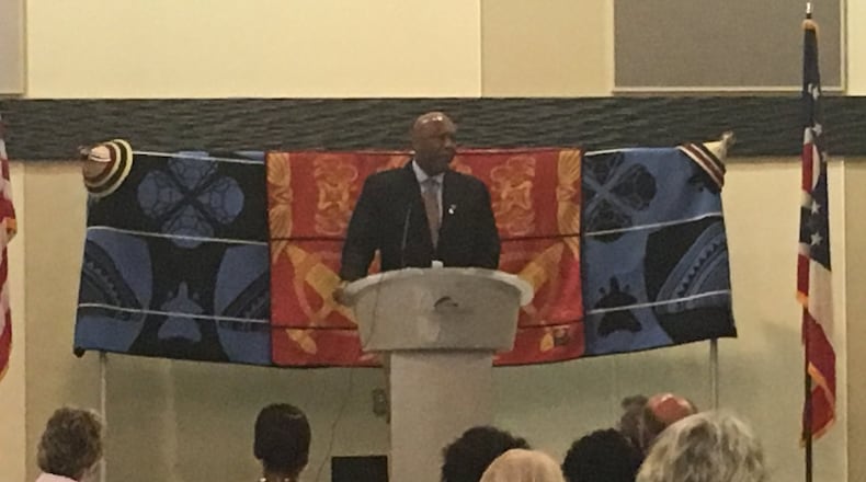 King Letsie III speaks to the Springfield Rotary Club Monday about the partnership between the club and his country.