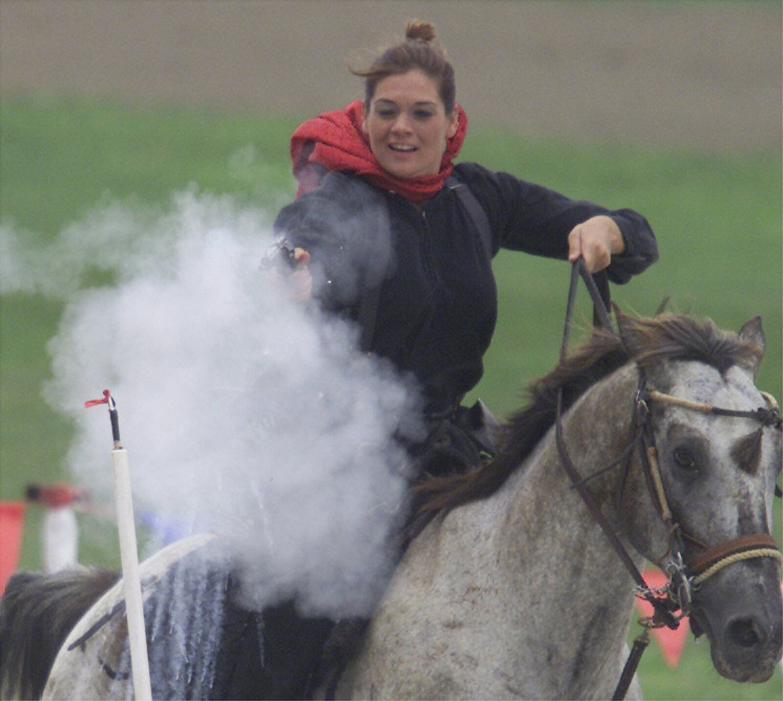 Darke County pays homage to Phoebe Anne Moses — better known as Annie Oakley — every year. Tiffany Richardson of Dayton shoots out a balloon while on horse back during a past festival. STAFF