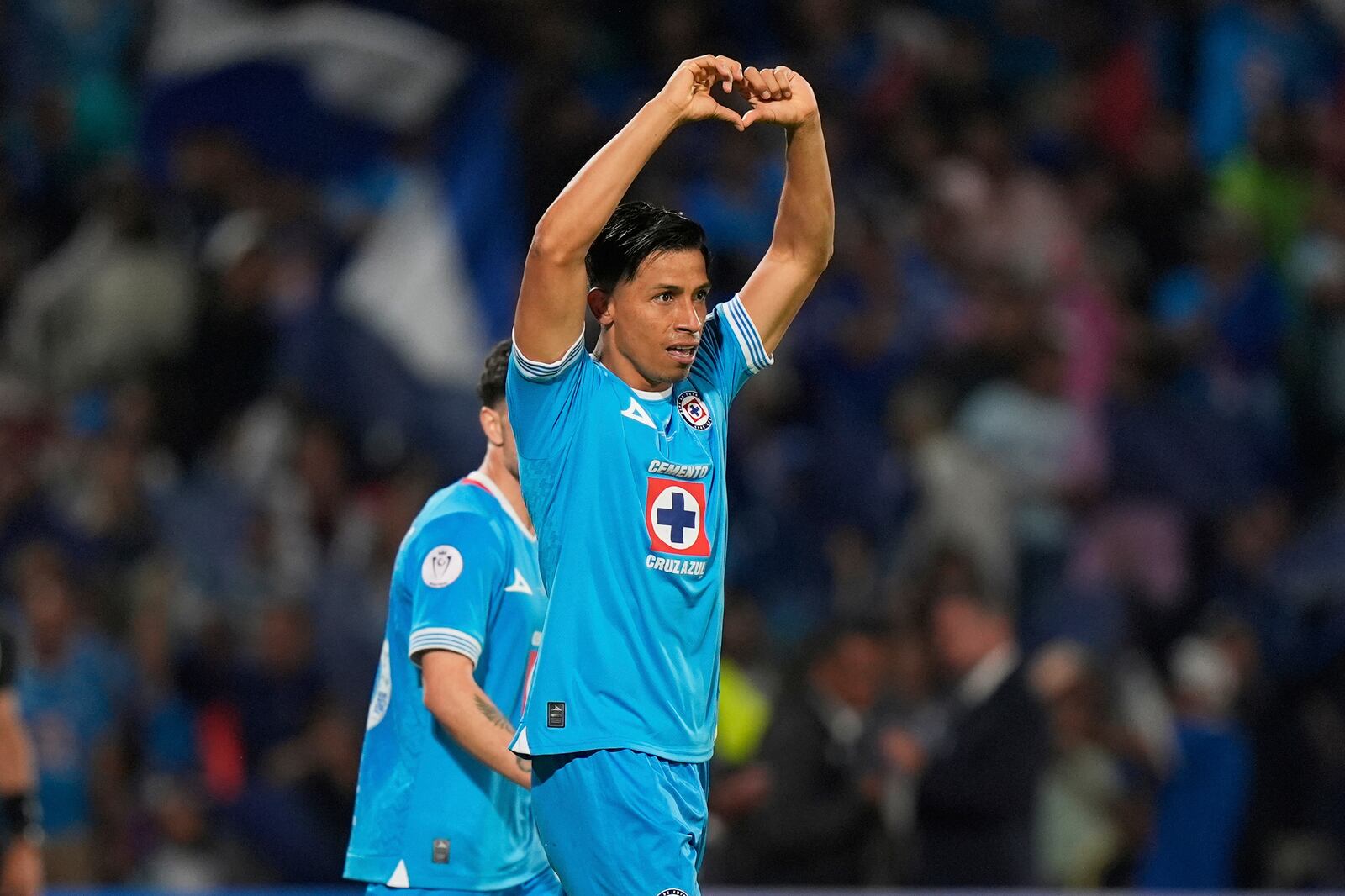 Angel Sepulveda of Mexico's Cruz Azul celebrates scoring his side's 5th goal against Canada's Vancouver Whitecaps during the CONCACAF Champions Cup final soccer match in Mexico City, Sunday, June 1, 2025. (AP Photo/Fernando Llano)