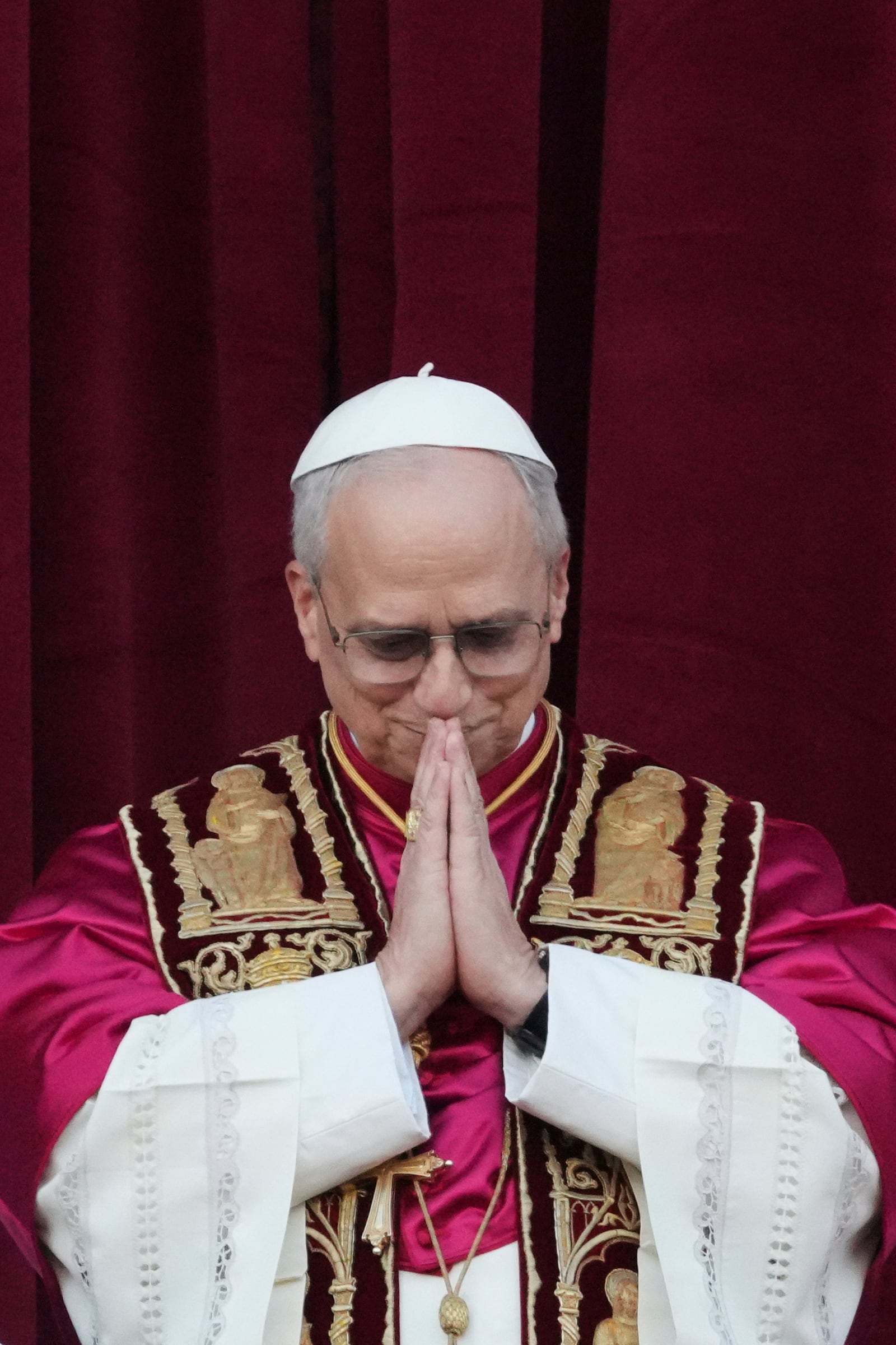 Newly elected Pope Leo XIV appears at the balcony of St. Peter's Basilica at the Vatican, Thursday, May 8, 2025. (AP Photo/Alessandra Tarantino)