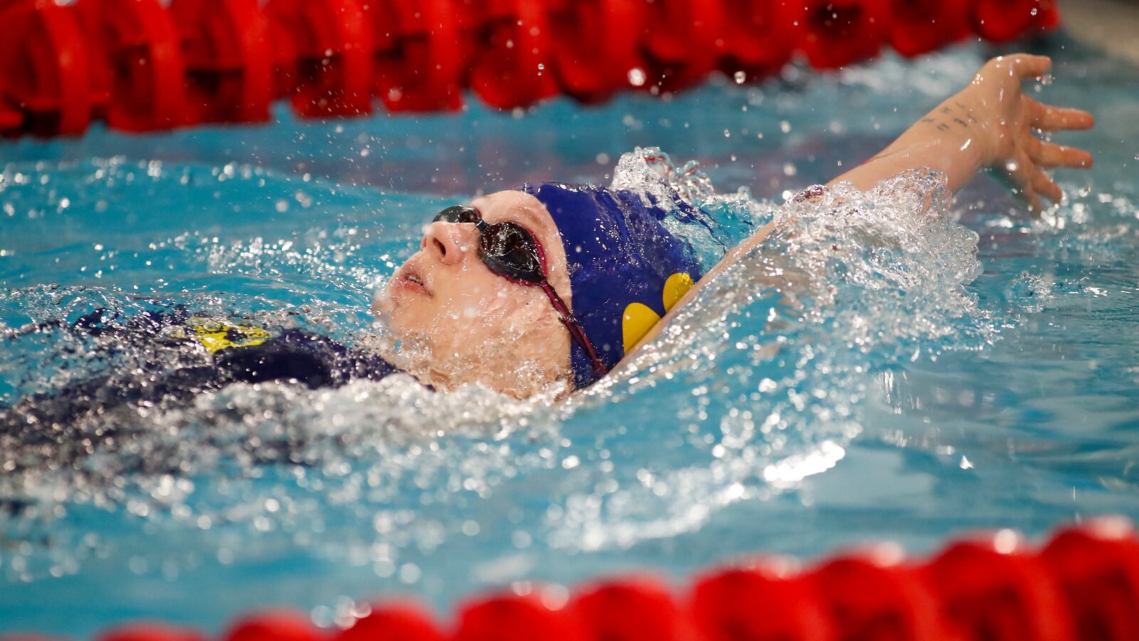 Springfield High School senior Reese Turner swims during the Clark County Invitational on Sunday morning at the Springfield Family YMCA. CONTRIBUTED PHOTO BY MICHAEL COOPER