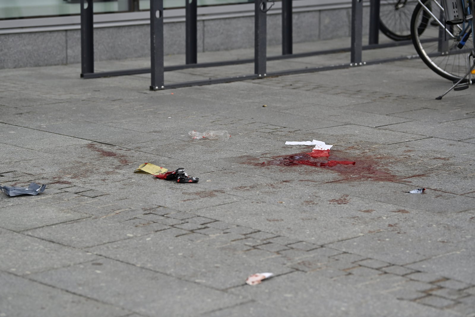 Bloodstains are seen outside the Ratina shopping centre in Tampere, Finland, Thursday July 3, 2025, after several people were stabbed. (Saara Peltola/Lehtikuva via AP)