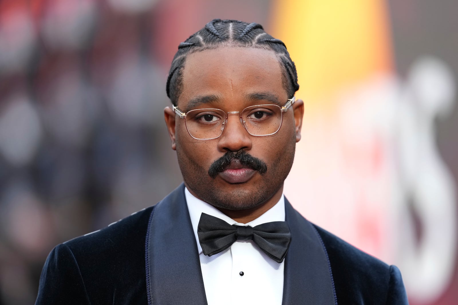 Director Ryan Coogler poses for photographers upon arrival at the premiere of the film 'Sinners' on Monday, April 14, 2025, in London. (Photo by Scott A Garfitt/Invision/AP)