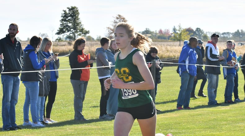 Catholic Central senior Bridget Engel finished second to twin sister Addie as both claimed district championships at the Division III district meet Saturday in Cedarville. Greg Billing / Contributed