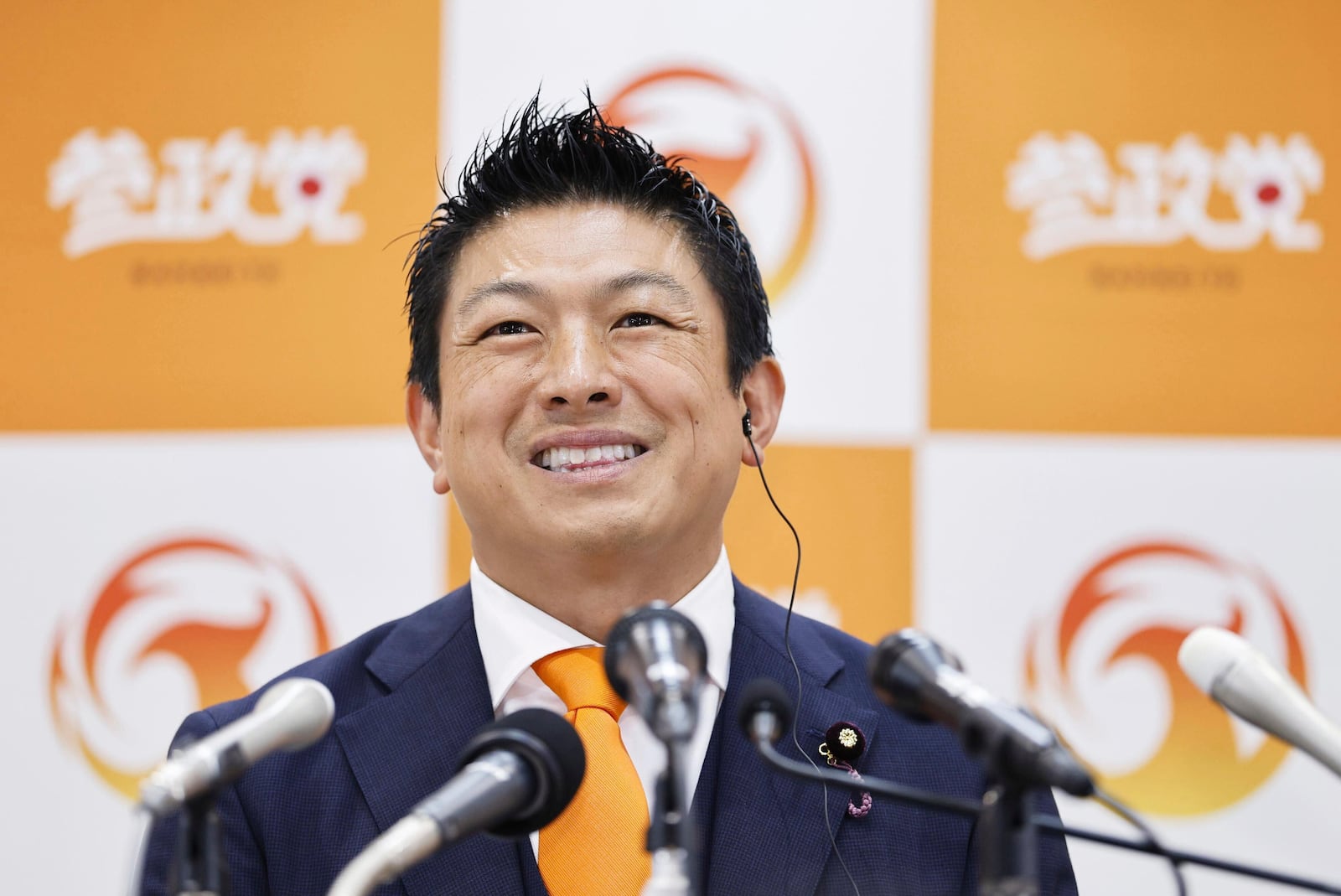 Sohei Kamiya, leader of Sanseito party speaks to the media following the upper house election in Tokyo, Sunday, July 20, 2025. (Kyodo News via AP)