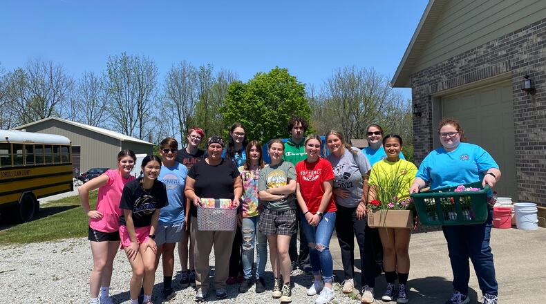 The Tecumseh High School Junior Optimist Club landscaped a yard for Tammy Matt, one of the district’s bus drivers and who is battling breast cancer, as one of their most recent service projects. Contributed