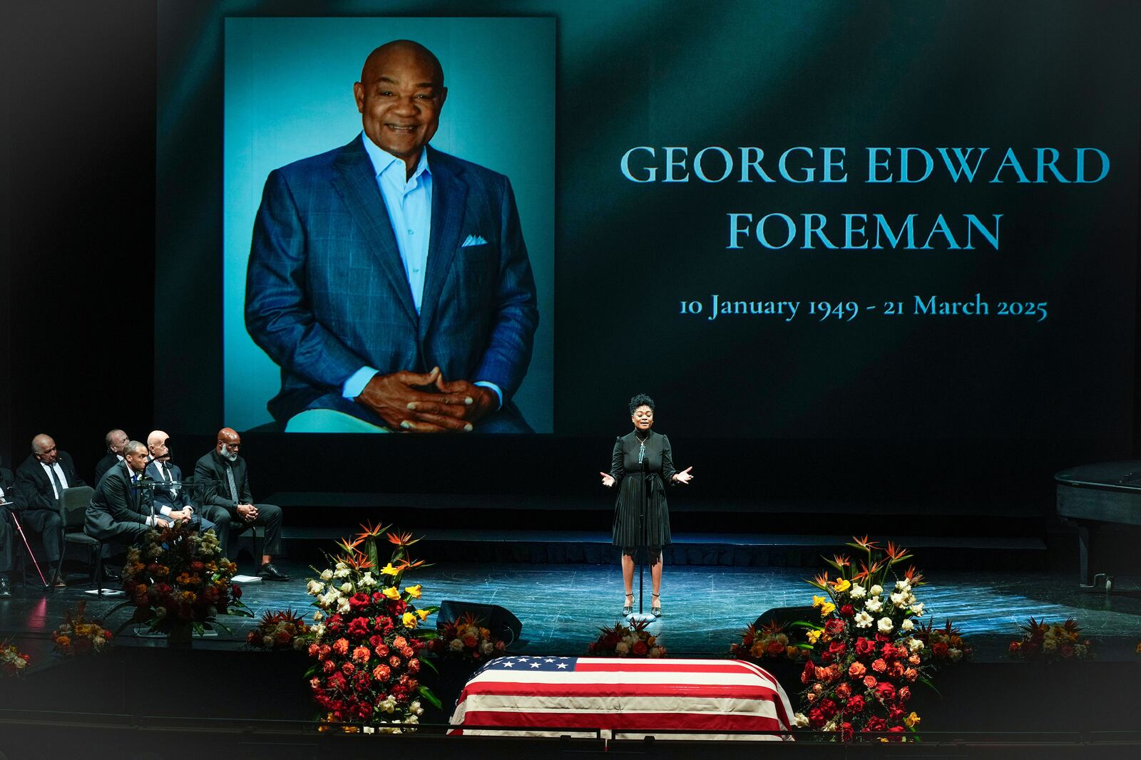 Dana Clark Green sings "Precious Lord" during a memorial service for Olympic and world champion boxer and minister George Foreman at Wortham Theater Center in Houston, Monday, April 14, 2025. (Brett Coomer/Houston Chronicle via AP)