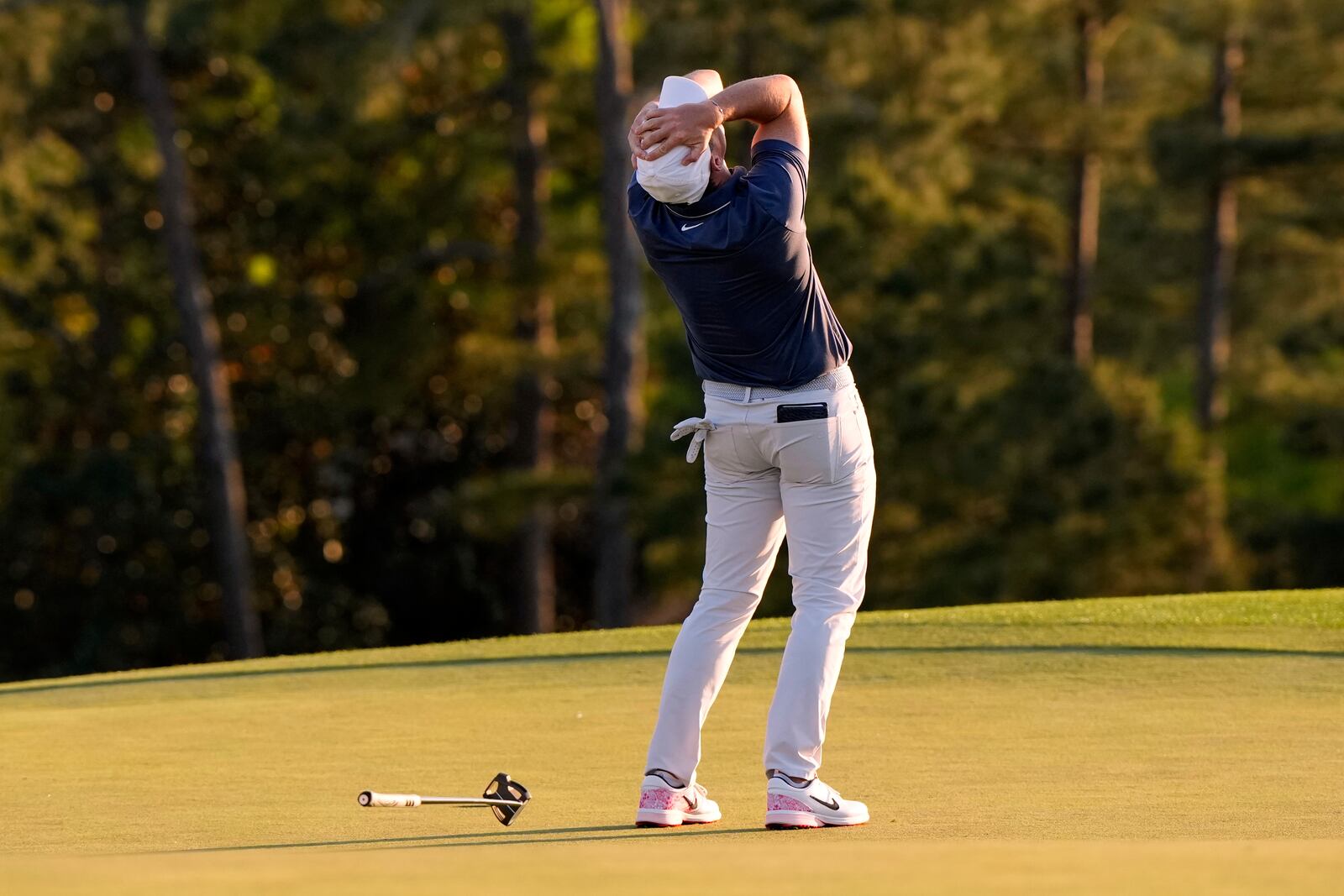 Rory McIlroy, of Northern Ireland, celebrates winning in a playoff against Justin Rose, of England, after the final round the Masters golf tournament, Sunday, April 13, 2025, in Augusta, Ga. (AP Photo/David J. Phillip)