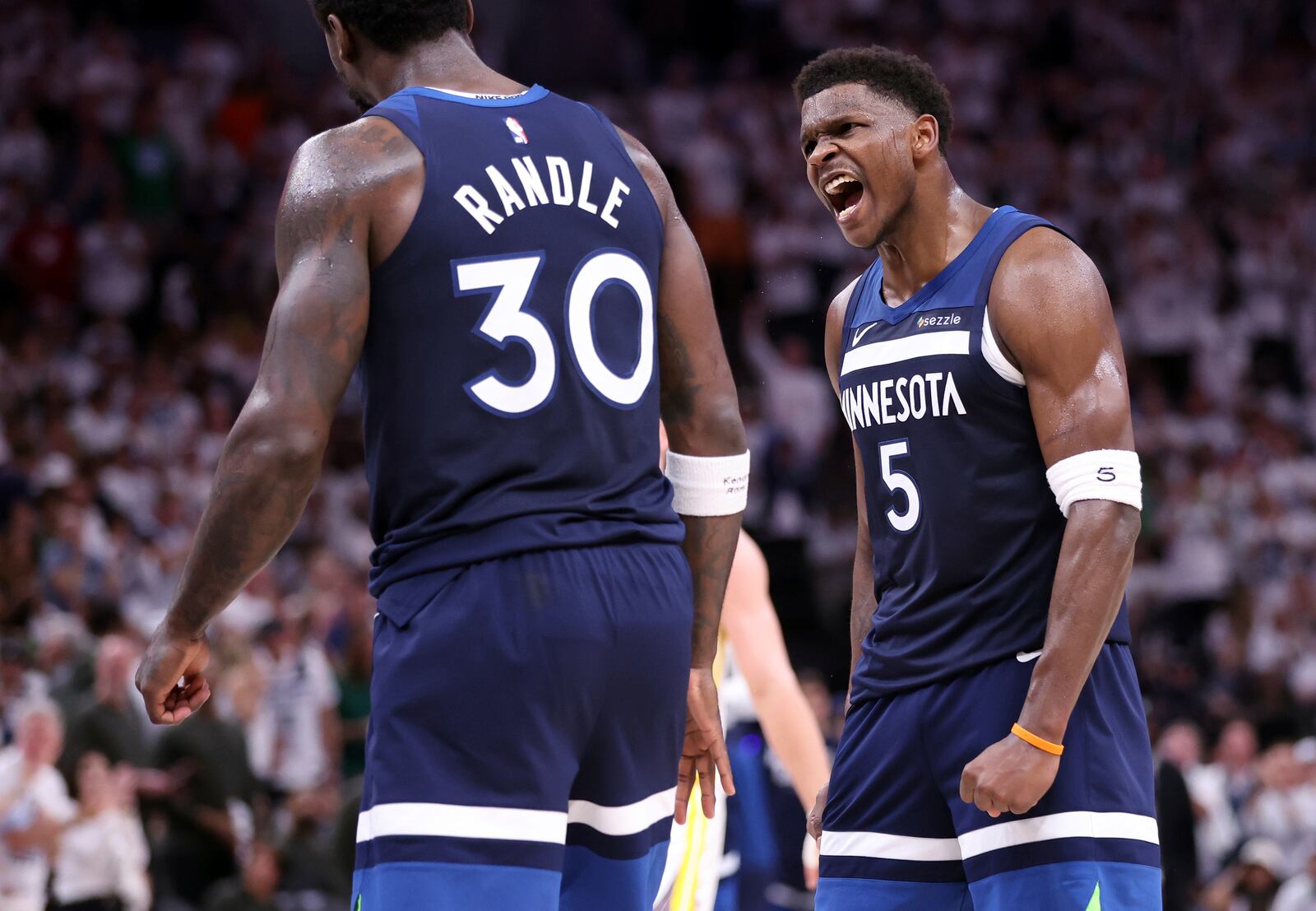 Minnesota Timberwolves' Anthony Edwards celebrates a basket and a foul for Julius Randle in 2nd quarter in NBA Western Conference Semifinals' Game 5 at Target Center in Minneapolis on Wednesday, May 14, 2025.(Scott Strazzante/San Francisco Chronicle via AP)