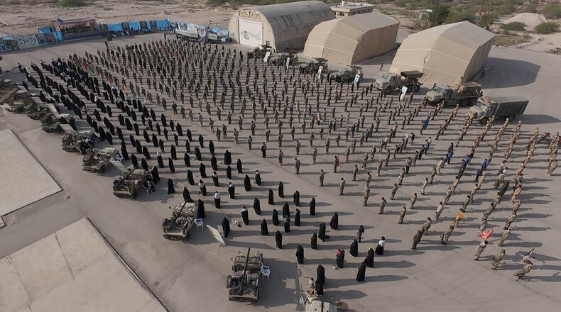 In this image provided by Sepahnews of the Iranian Revolutionary Guard on Feb. 16, 2026, shows troops standing at attention during the guard's drill in the Persian Gulf on Monday, Feb. 16, 2026. (Sepahnews via AP)
