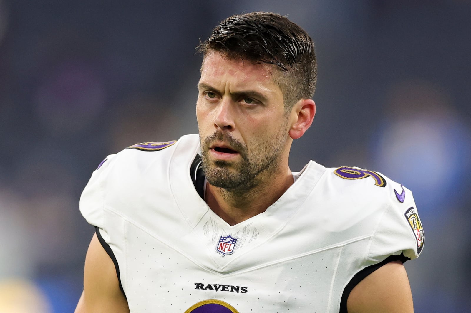 FILE - Baltimore Ravens place kicker Justin Tucker (9) walk on the field before an NFL football game against the Los Angeles Chargers, Monday, Nov. 25, 2024, in Inglewood, Calif. (AP Photo/Ryan Sun, FIle)