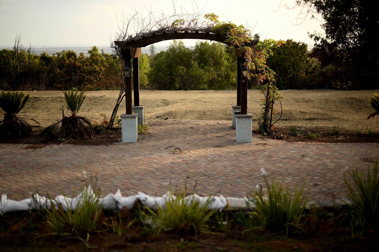 An empty lot sits alone along Cerro Crest Drive after the Mountain Fire burned through the area Wednesday, April 16, 2025, in Camarillo, Calif. (AP Photo/Wally Skalij)
