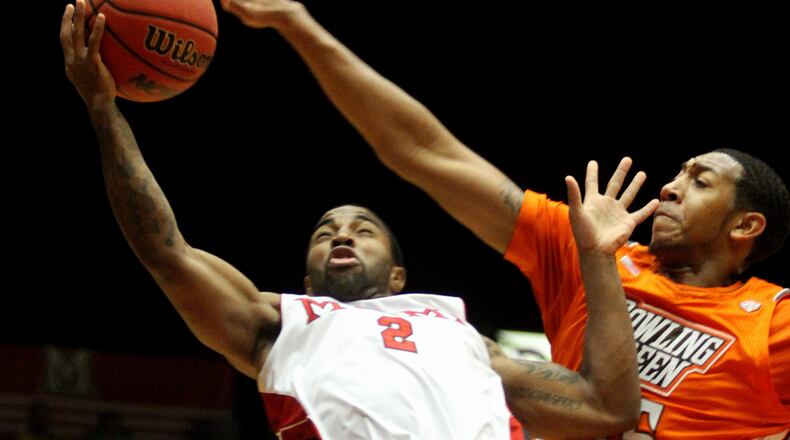 E.L. Hubbard photography Miami guard Quinten Rollins gets the basket and is fouled by Bowling Green forward/center Cameron Black during their game at Millett Hall in Oxford Wednesday, Jan. 16, 2013.