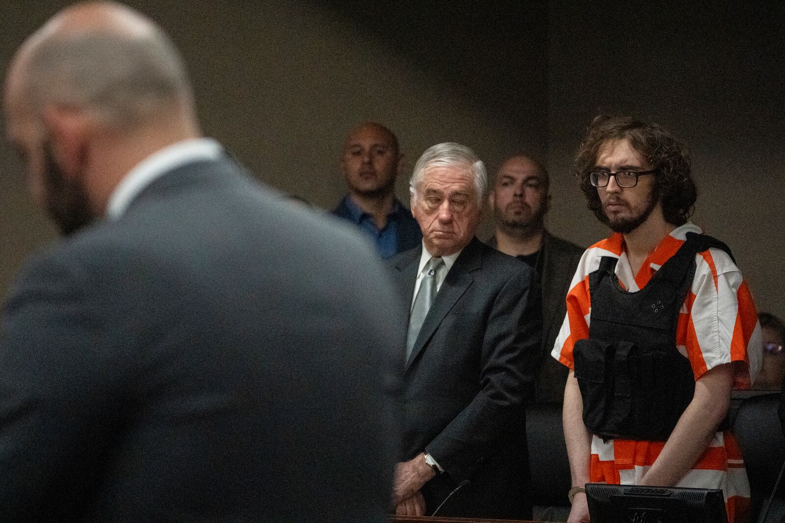Patrick Crusius stands up to listen to the charges from Judge Sam Medrano in the 409th district Commissioners Courtroom at the Enrique Moreno County Courthosue during his sentencing in El Paso, Texas, April 21, 2025. (Omar Ornelas/Pool Photo via AP)