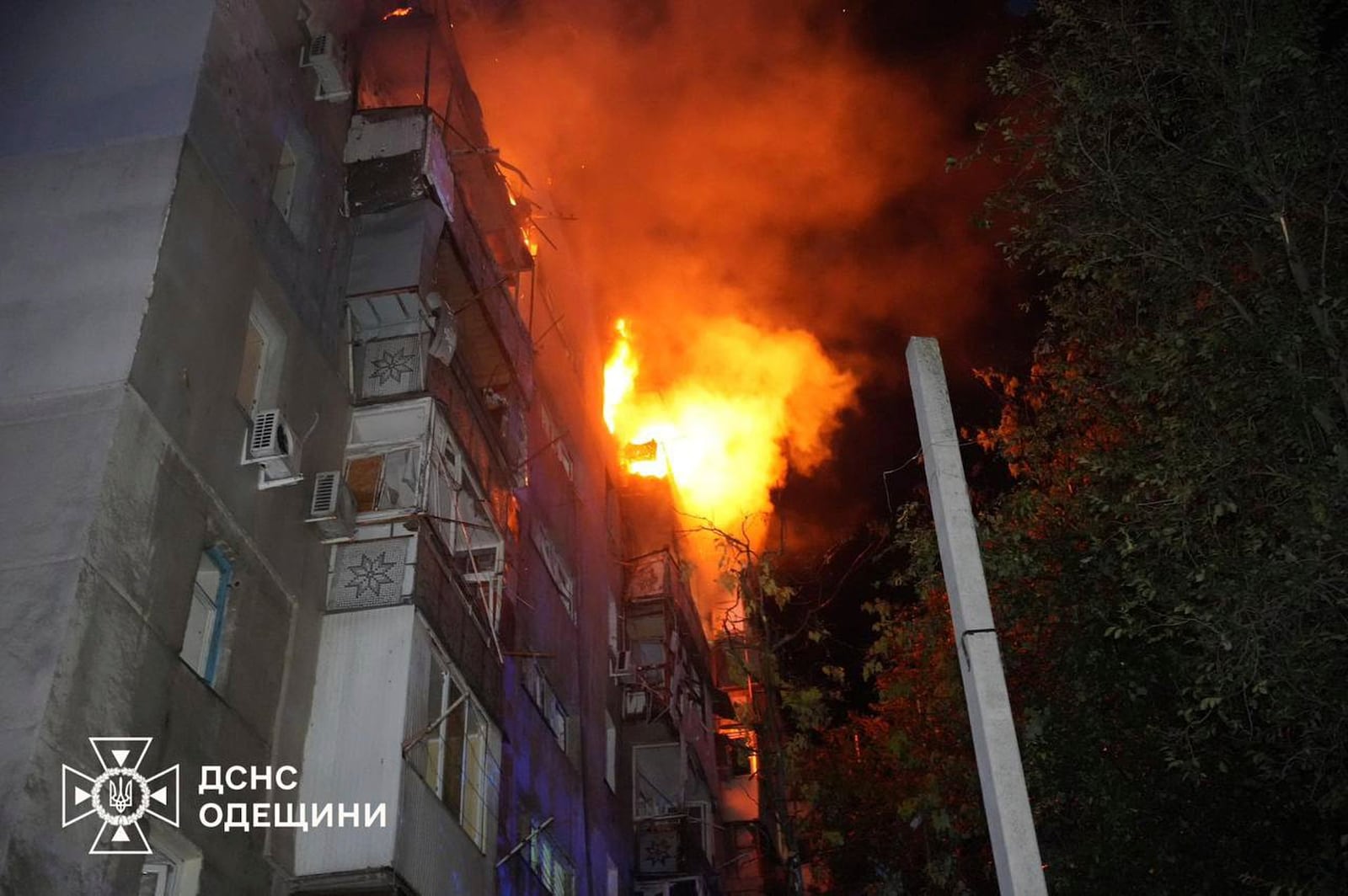 In this photo provided by the Ukrainian Emergency Service, a residential building burns following a Russian air attack in Odesa, Ukraine, Saturday, July 19, 2025. (Ukrainian Emergency Service via AP)