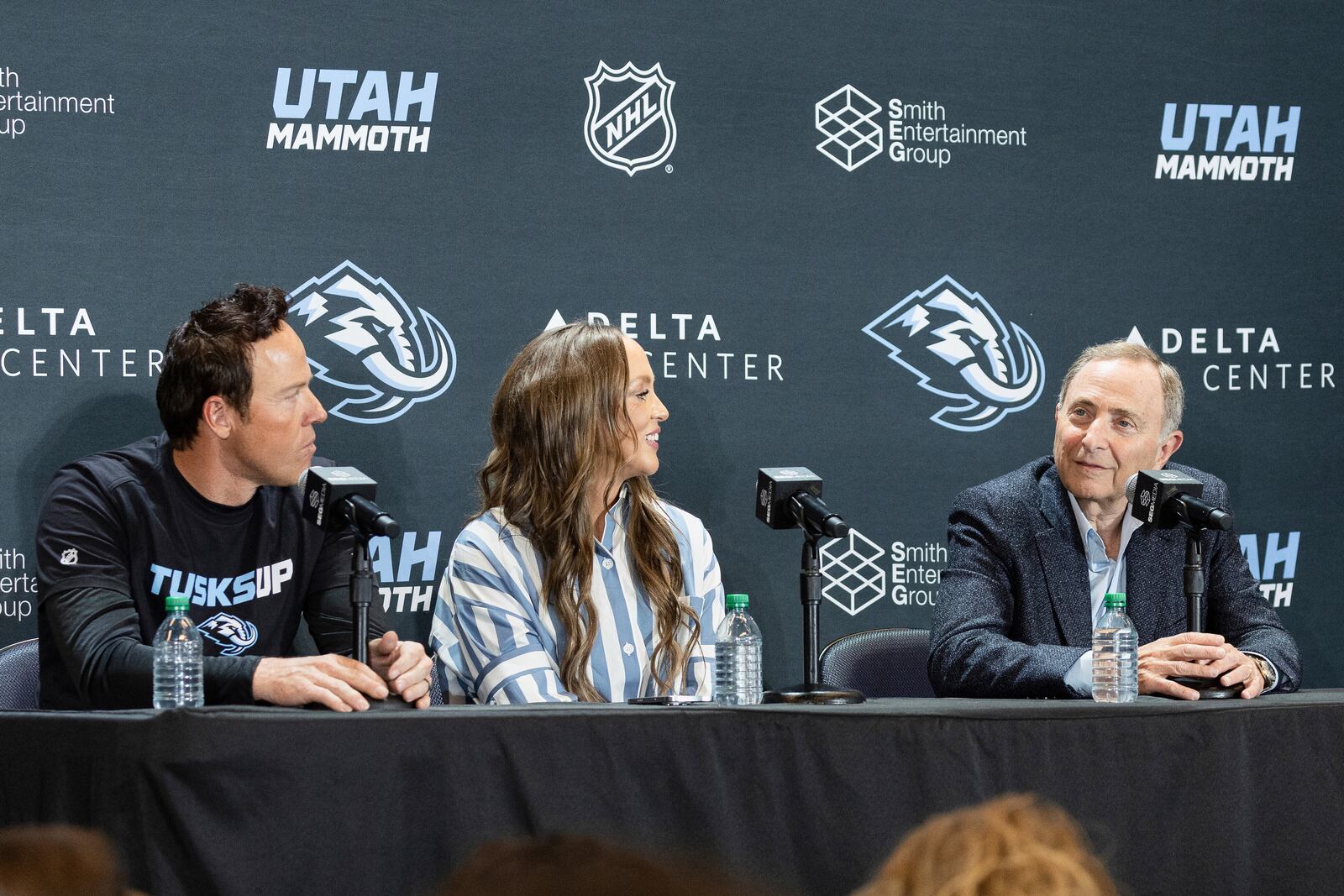 Chairman of Smith Entertainment Group Ryan Smith, Co-Founder Ashley Smith and NHL Commissioner Gary Bettman, from left, announce the Utah Mammoth as the new name and branding identity of Utahs NHL franchise, Wednesday, May 7, 2025, in Salt Lake City. (AP Photo/Melissa Majchrzak)