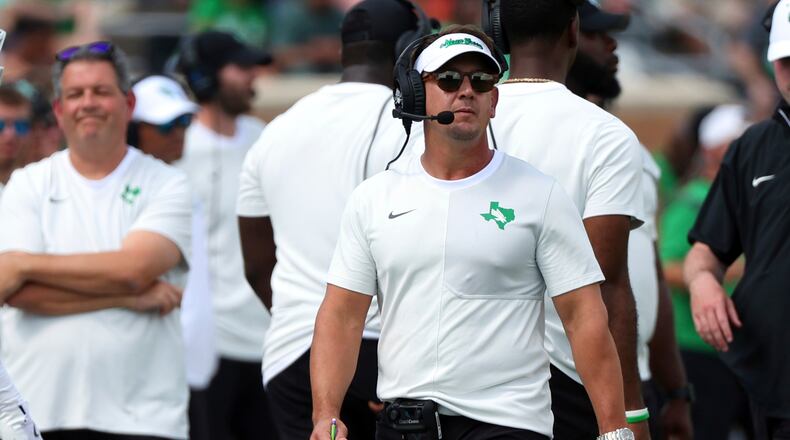 FILE - North Texas head coach Eric Morris walks the sideline during an NCAA college football game against Washington State, Sept. 13, 2025, in Denton, Texas. (AP Photo/Richard W. Rodriguez, file)