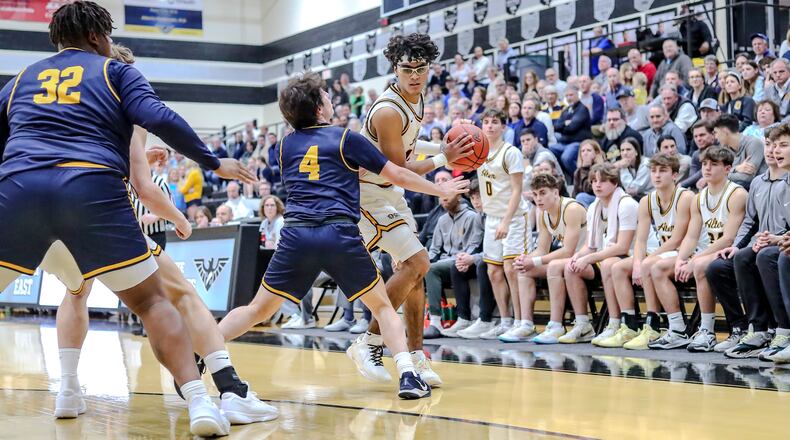 The Alter High School boys basketball team beat Oakwood 69-54 in a Division IV regional semifinal game on Tuesday, March 4 at Lakota East High School. MICHAEL COOPER/CONTRIBUTED