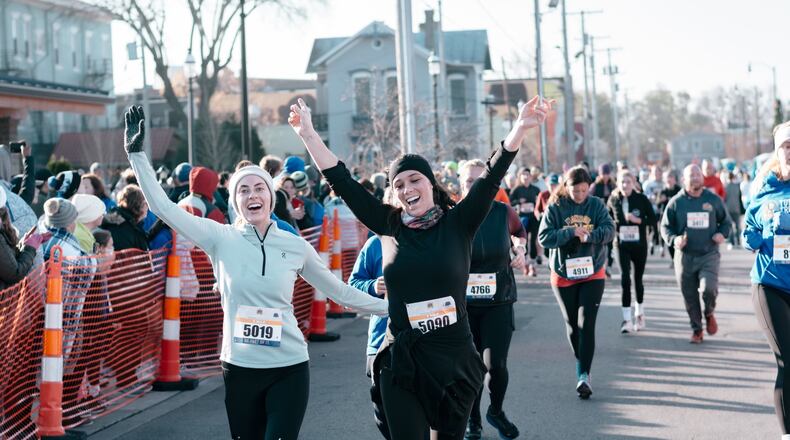 Miamisburg’s Turkey Trot is the Ohio River Road Runners Club’s biggest event of the year, drawing thousands of participants to the city's downtown each Thanksgiving. Margaret Hurley and Greg Bell have been directing the event since 2014. CONTRIBUTED