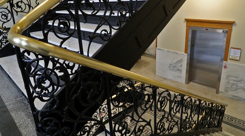 The grand staircase in the newly renovated A.B. Graham Building with a new elevator. BILL LACKEY/STAFF