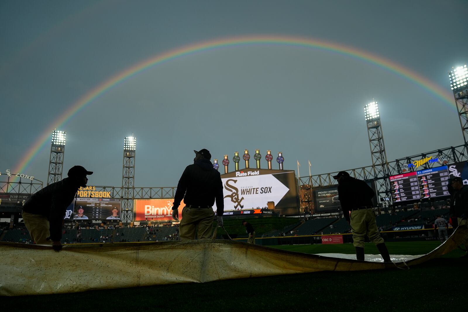 A double rainbow forms over Rate Field during a rain delay before a baseball game between the Detroit Tigers and Chicago White Sox, Wednesday, June 4, 2025, in Chicago. (AP Photo/Erin Hooley)