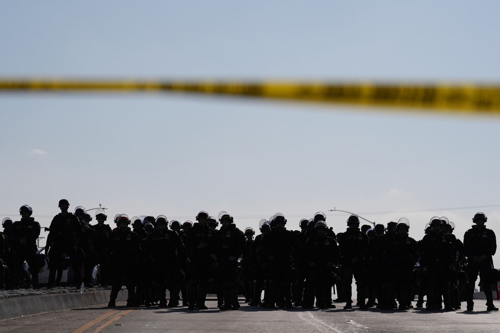 Los Angeles County Sheriffs block a road during a protest on Wednesday, June 11, 2025, in Paramount, Calif. (AP Photo/Jae C. Hong)