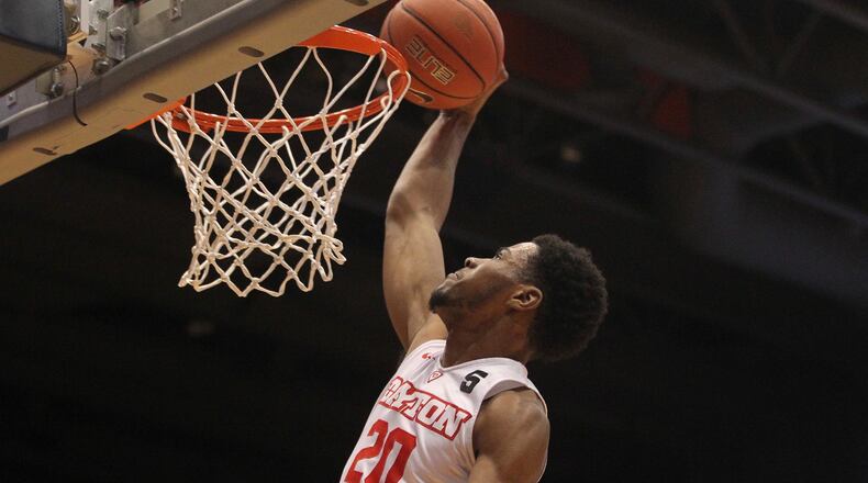 Dayton’s Xeyrius Williams dunks against St. Joseph’s on Tuesday, Feb. 7, 2017, at UD Arena. David Jablonski/Staff