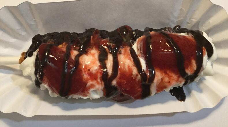 Fudge Puppies are the new treat on the block at the Troy Strawberry Festival. These Belgium waffles on a stick are dipped in fudge and then topped to your liking with toppings including strawberries, whipped cream, caramel, chocolate, peanut butter, sprinkles and more. CONTRIBUTED