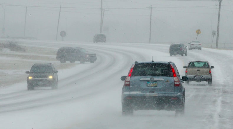 Snowfall caused hazzardous road conditions along Ohio 128 in Hamilton on Thursday, Jan. 16.