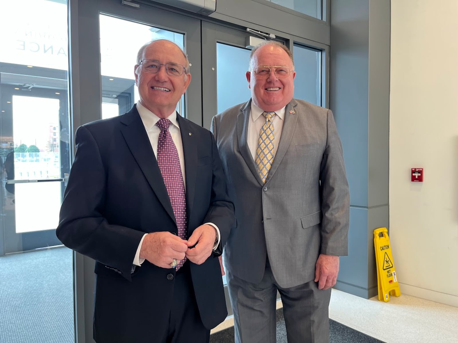 Two former Air Force officers who served at Wright-Patterson Air Force Base during the 1995 talks that resulted in the Dayton Peace Accords. From left, retired Col. Robbie Robinson, former commander of the 88th Air Base Wing, and retired Lt. Col. John McCance, a former spokesman for the 445th Airlift Wing. THOMAS GNAU/STAFF