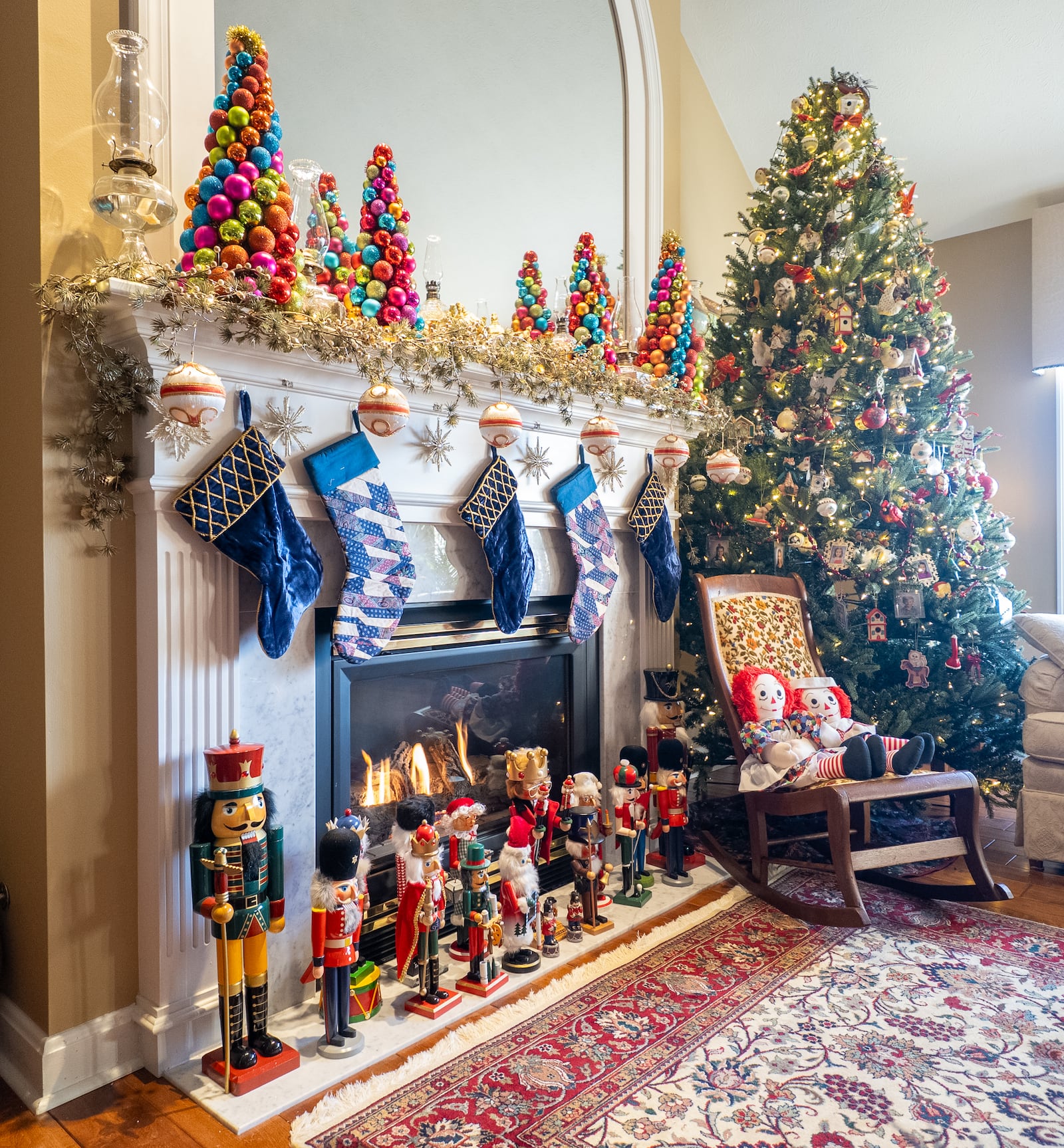 Nutcrackers line the fireplace at the Wales home in Miami Twp., where Christmas decor includes an estimated 1,000 items throughout the home. BRYANT BILLING/STAFF