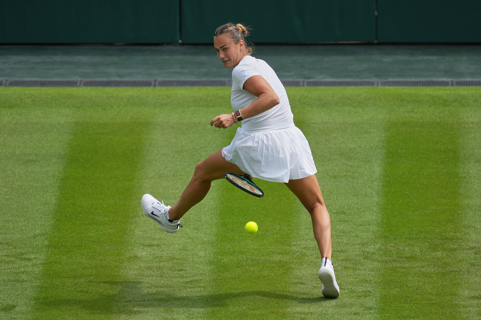 Aryna Sabalenka of Belarus plays a return to Coco Gauff of United States during a practice session ahead of the Wimbledon Championships in London, Friday, June 27, 2025. (AP Photo/Kin Cheung)